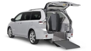 How do wheelchair users get in a Taxi?