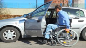 How do you secure a wheelchair in a taxi?